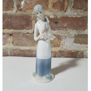 Glass figurine Girl Holding Dog Light Blue And White. Good Condition